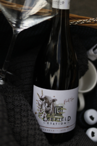 Leefield Station Pinot Noir – Beauty – Bottle in Basket